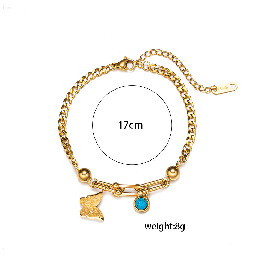 Geometric Stainless Steel Plated 18K Gold Butterfly-Shaped Bracelet with Turquoise Inlay and Horseshoe Clasp
