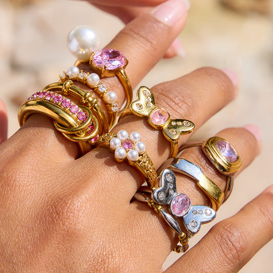 Anello da donna in acciaio inossidabile geometrico all'avanguardia con intarsio di zirconi rosa, gioielli di lusso elettrodeposti