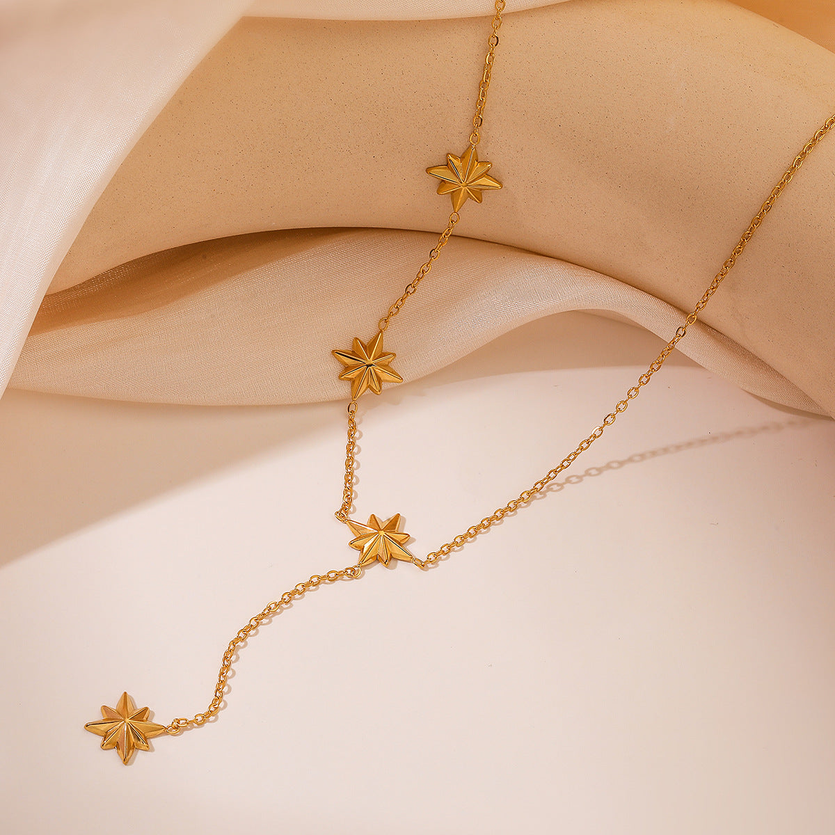 Collana con pendente a stella a otto punte geometrica minimalista da donna in acciaio al titanio placcato oro 18 carati