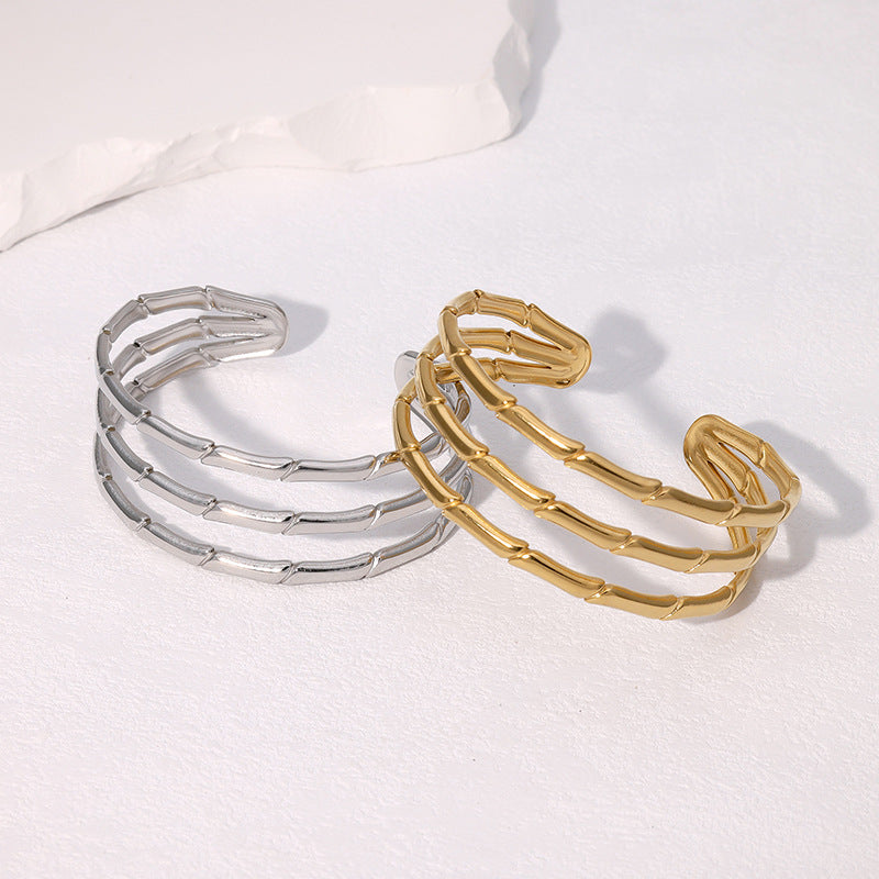 Bracciale minimalista a nodo di bambù in acciaio inossidabile placcato oro da donna con estetica fresca e delicata