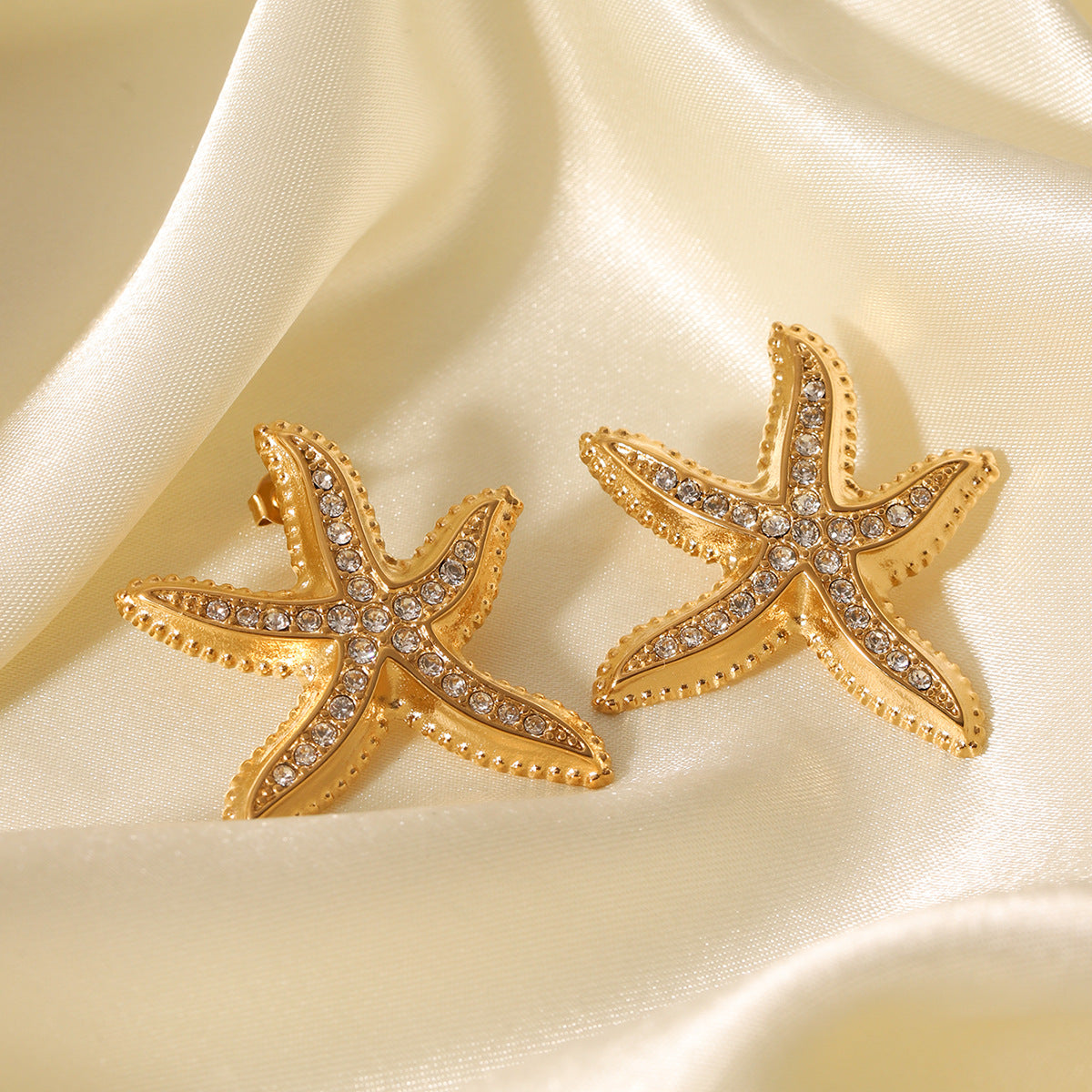 Orecchini a stella minimalisti in acciaio inossidabile con intarsio di strass placcati in oro 18 carati da donna