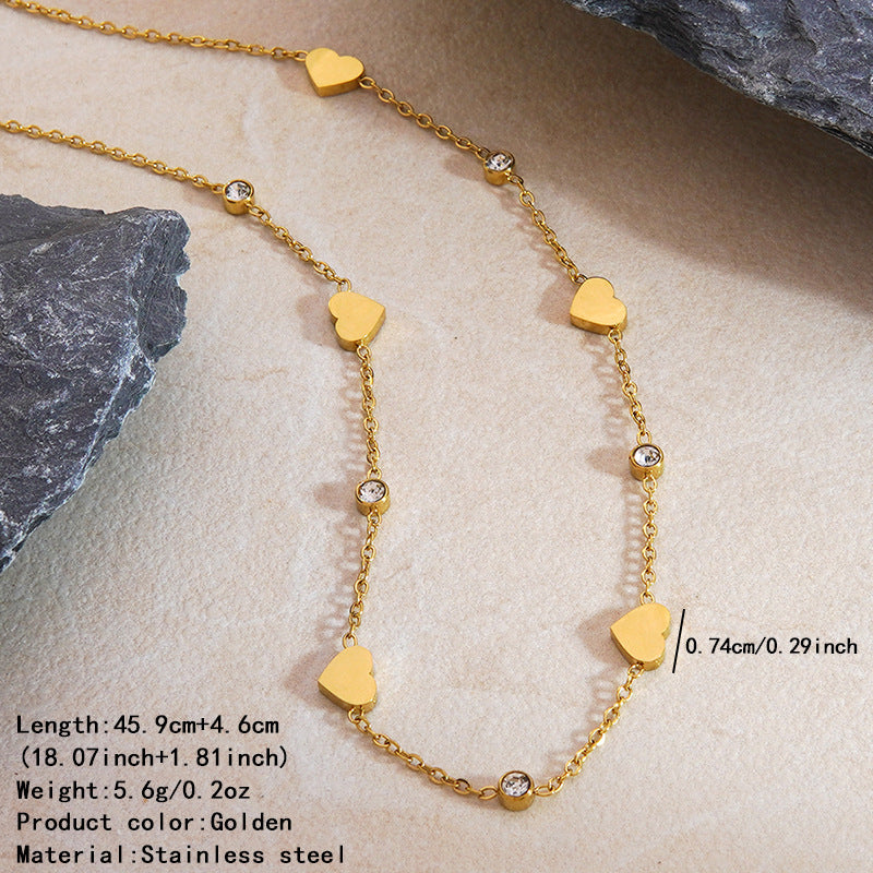 Elegante set collana e bracciale in oro 18 carati placcato con zirconi cubici a forma di cuore, catena in acciaio inossidabile e titanio per donne