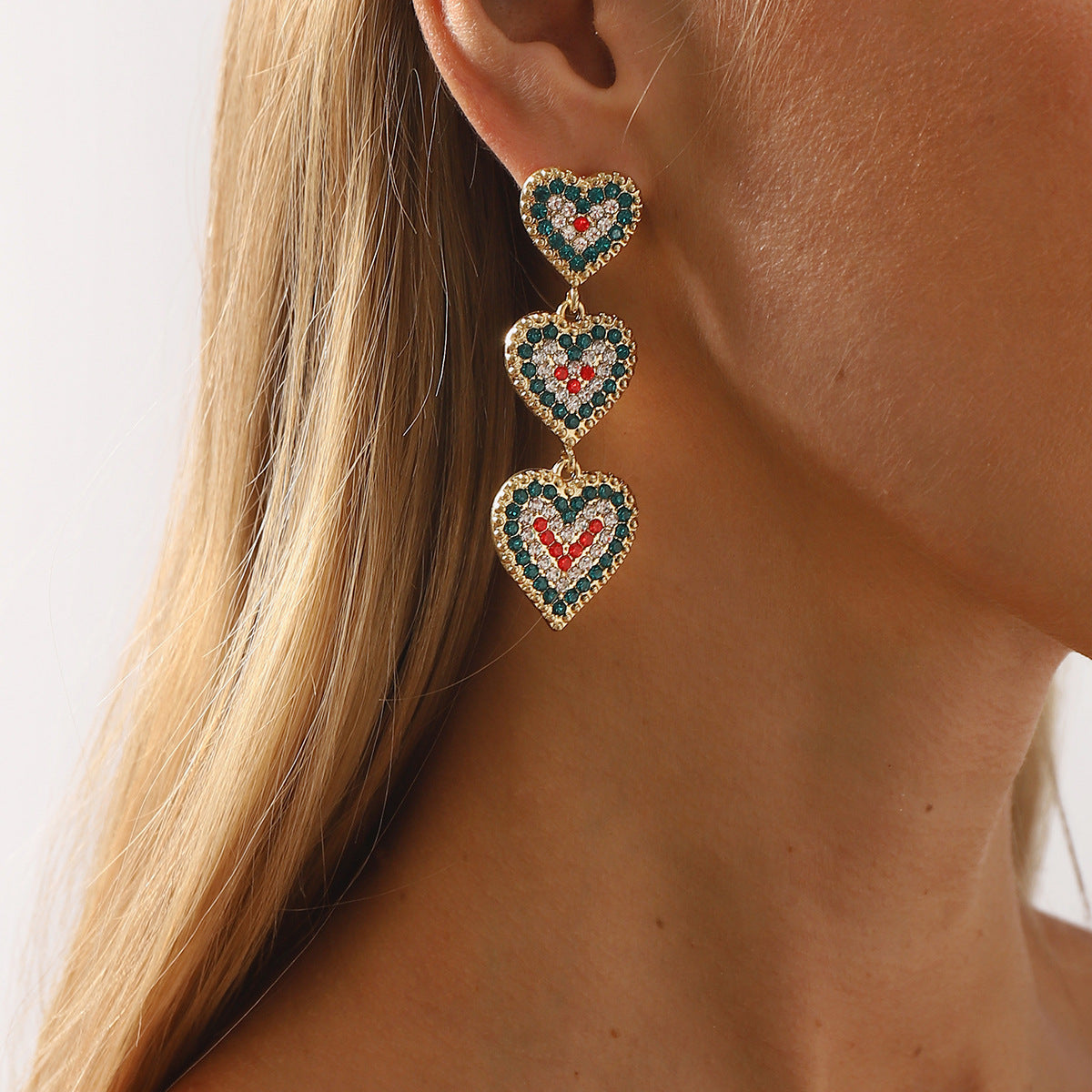 Pendientes de aleación con forma de corazón, temática navideña, incrustaciones de diamantes de imitación y lazo decorativo para mujer