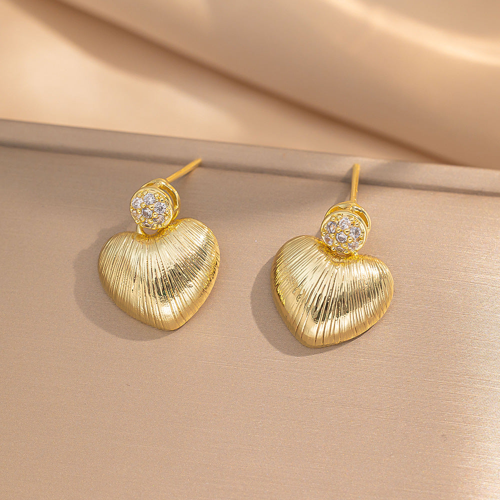 Orecchini a perno Saturno minimalisti color oro in ottone con zirconi per donna