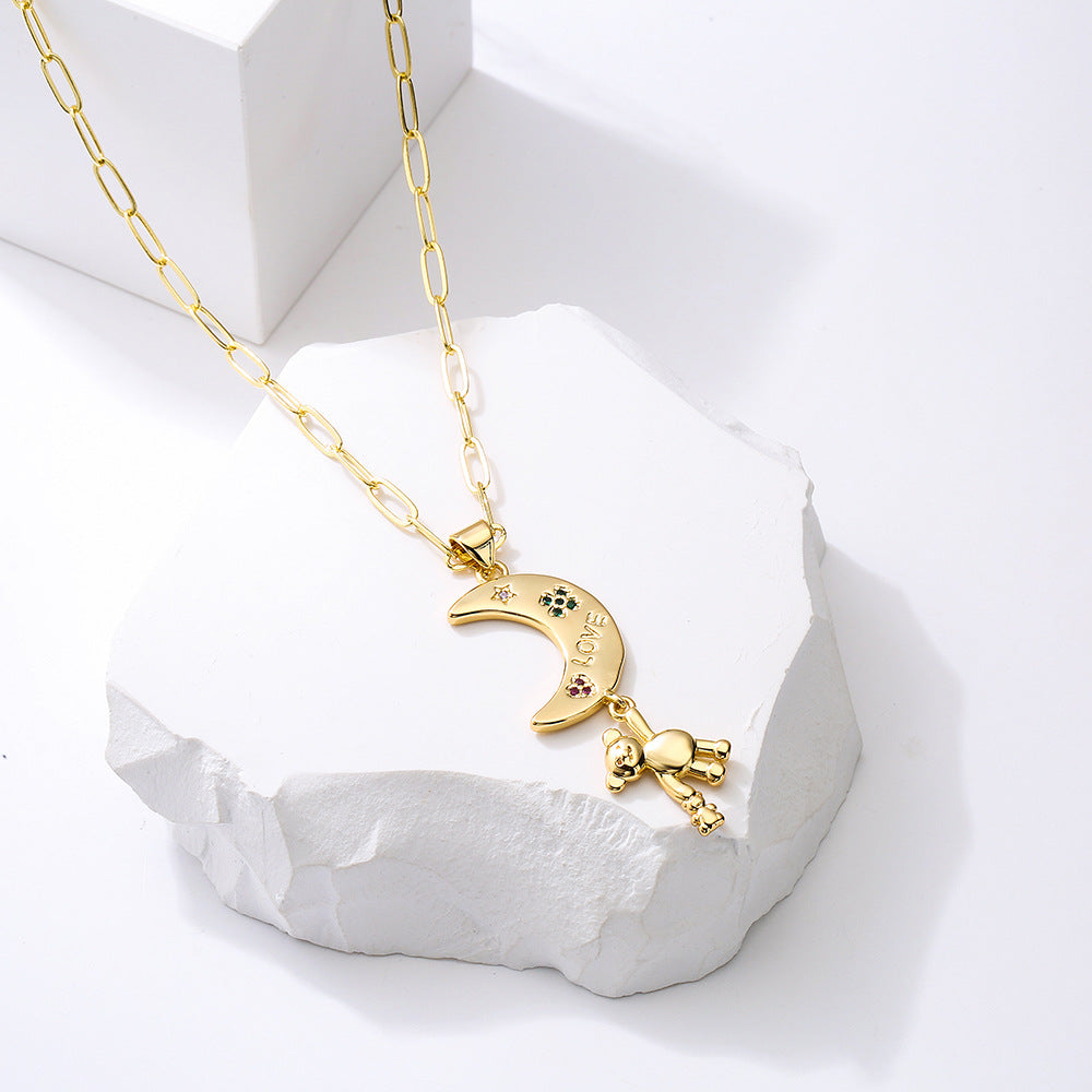 Collana con ciondolo orso luna minimalista da donna con base in rame placcata in oro vero e intarsio in zirconi