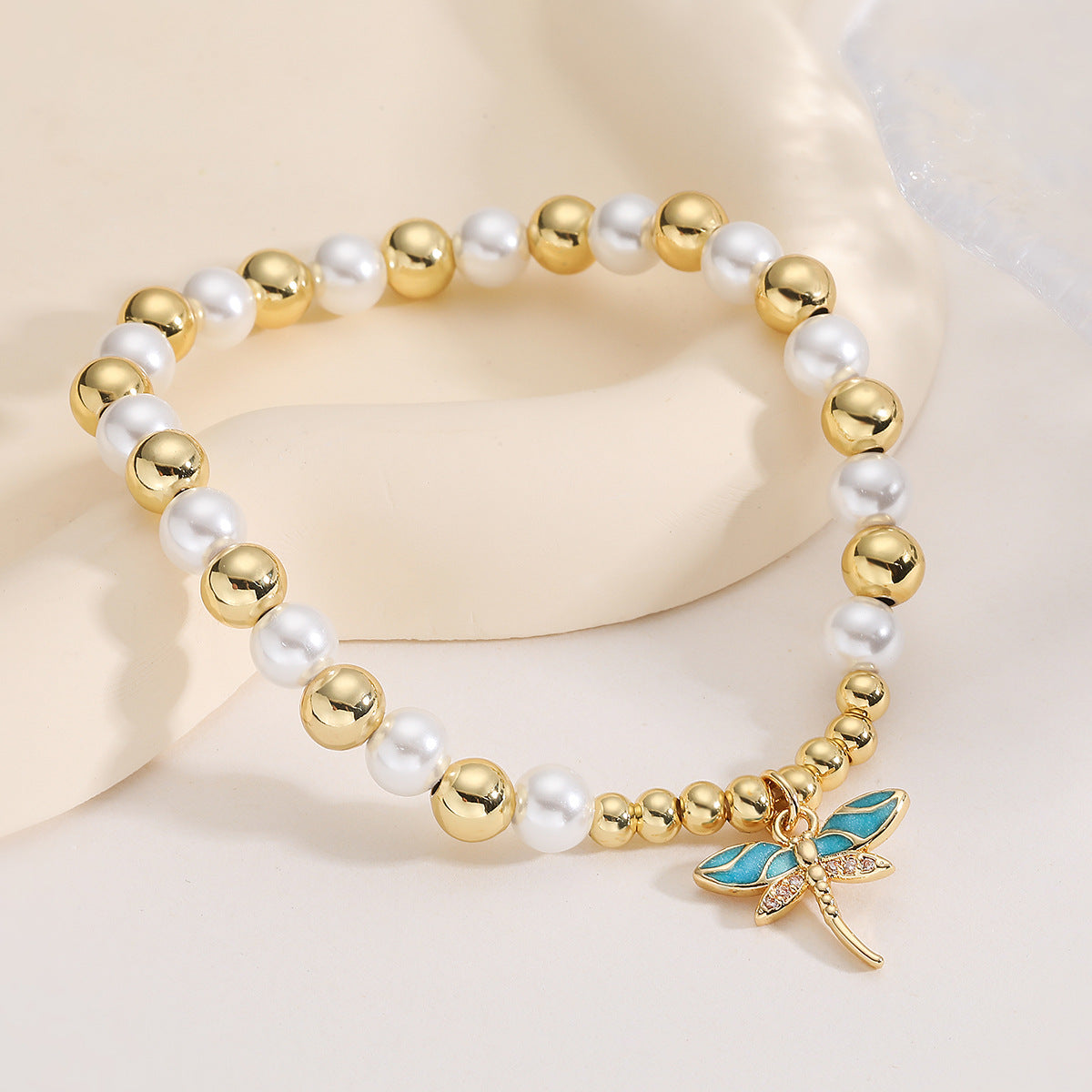 Elegant 18K Gold Plated Brass Geometric Dragonfly Pendant Bracelet with Cubic Zirconia Pearl and Drip Oil for Women