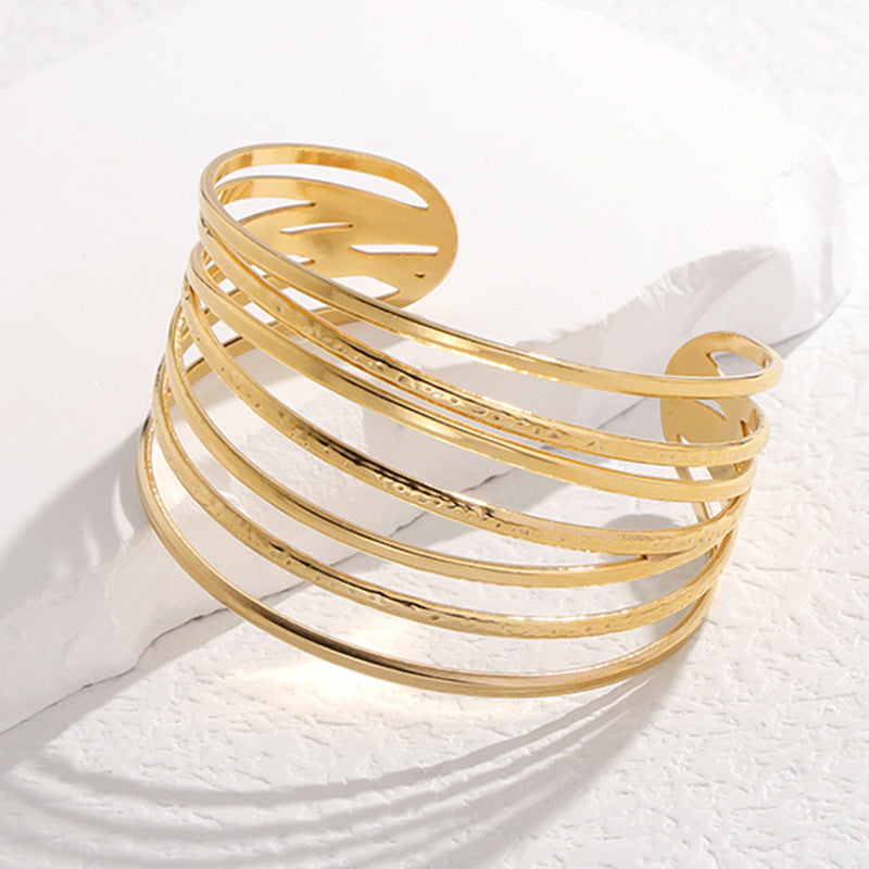 Bracciale in Acciaio al Titanio con Finitura Placcata, Linee Geometriche Minimaliste, da Donna