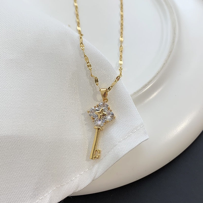 Retro-Style Key-Shaped Titanium Steel Necklace for Women with Plated Finish, Lip Chain Design, Tassel Pendant, Clavicle and Sweater Chain