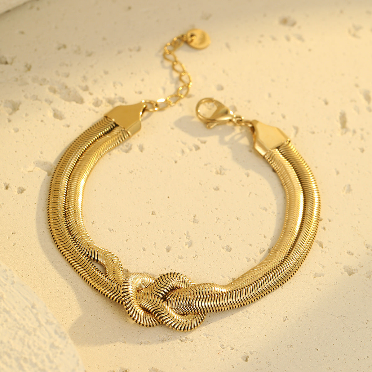 Fashionable Minimalist Knoted Snake Chain Bracelet for Women in Stainless Steel with Plated Finish