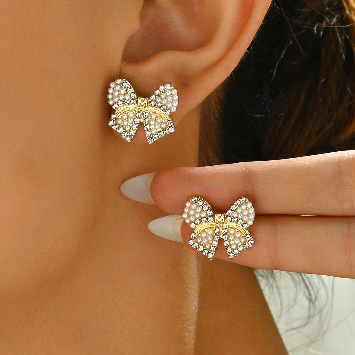 Pendientes minimalistas con lazo, incrustaciones en forma de corazón y flecos colgantes para mujer, de aleación de zinc y acero inoxidable electrochapado.