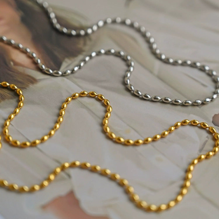Collana minimalista in acciaio al titanio con perline per uomo e donna con finitura placcata, catena a serpente da indossare a strati o da sola