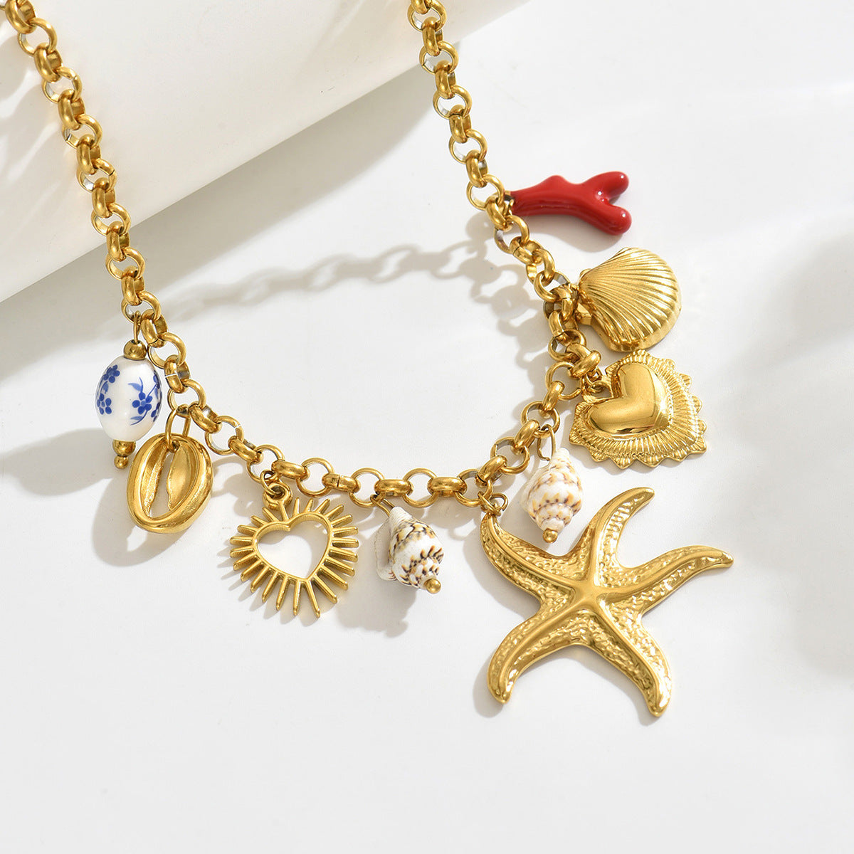 Collar con colgante geométrico de estrella de mar y concha en aleación con acabado chapado para mujer