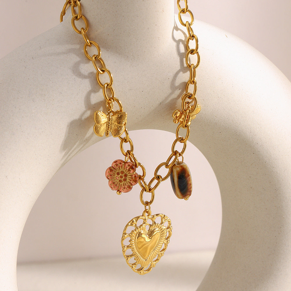 Luxury Vintage Hollow Heart Pendant Necklace in Stainless Steel with 18K Gold Plating on O-Chain