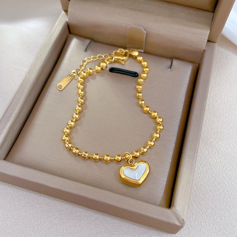 Pulsera de mano bohemia vintage de acero de titanio con corazón, cuentas redondas y ondas para mujer