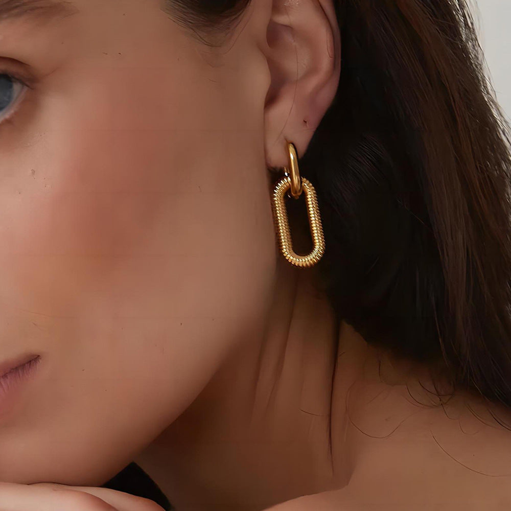 Orecchini da donna minimalisti in acciaio al titanio con pendente geometrico circolare staccabile e finitura galvanizzata