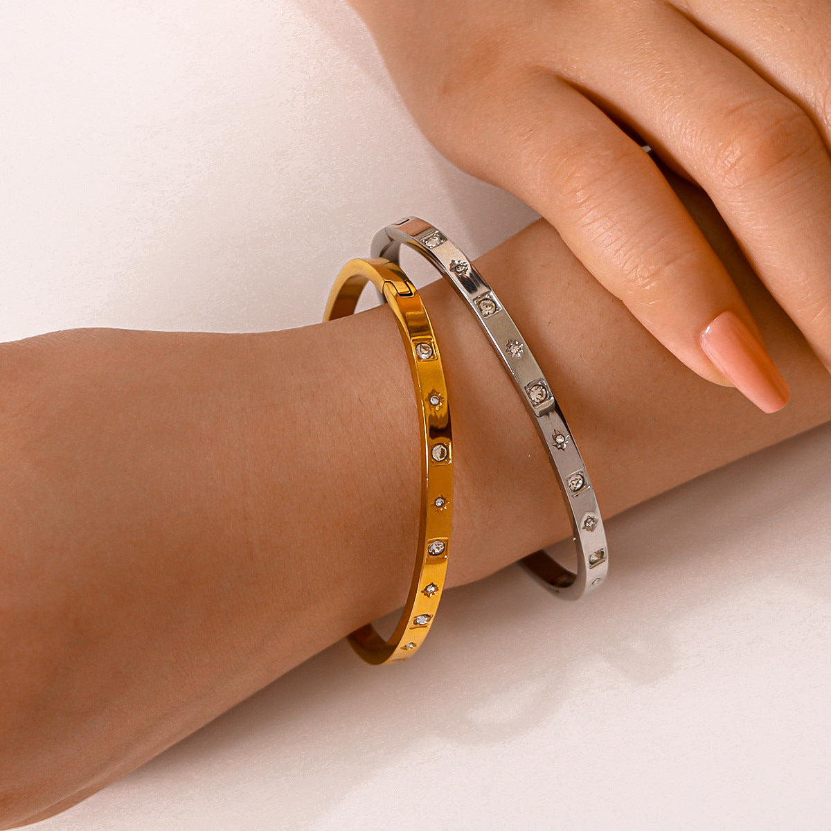 Minimalist Octagram Stainless Steel Bracelet with Micro-Pavé Star Detail and Plated Finish