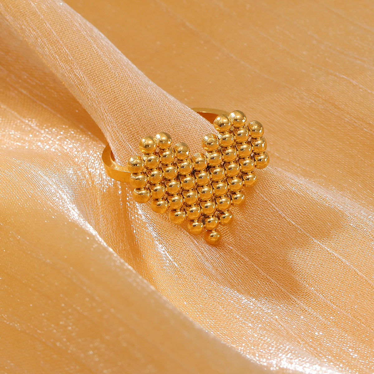 Anello da donna minimalista a forma di cuore in acciaio al titanio con finitura placcata, leggero e dal design lussuoso