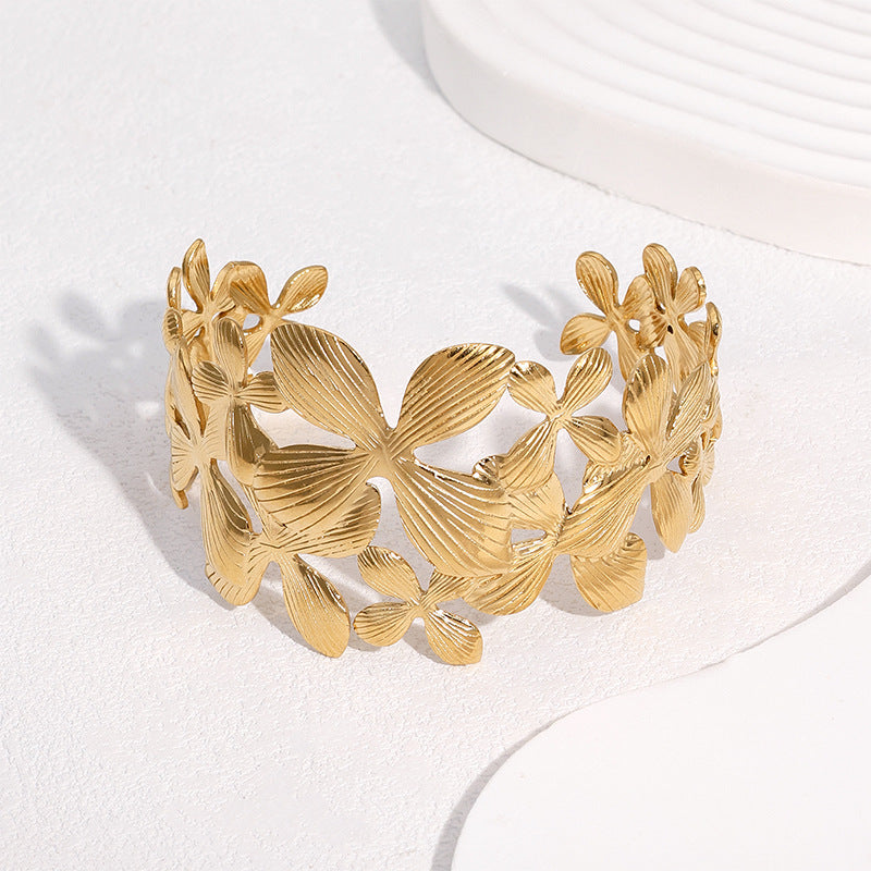 Minimalist 18K Gold Plated Stainless Steel Wide Cuff Bracelet with Lily Flower Design for Women