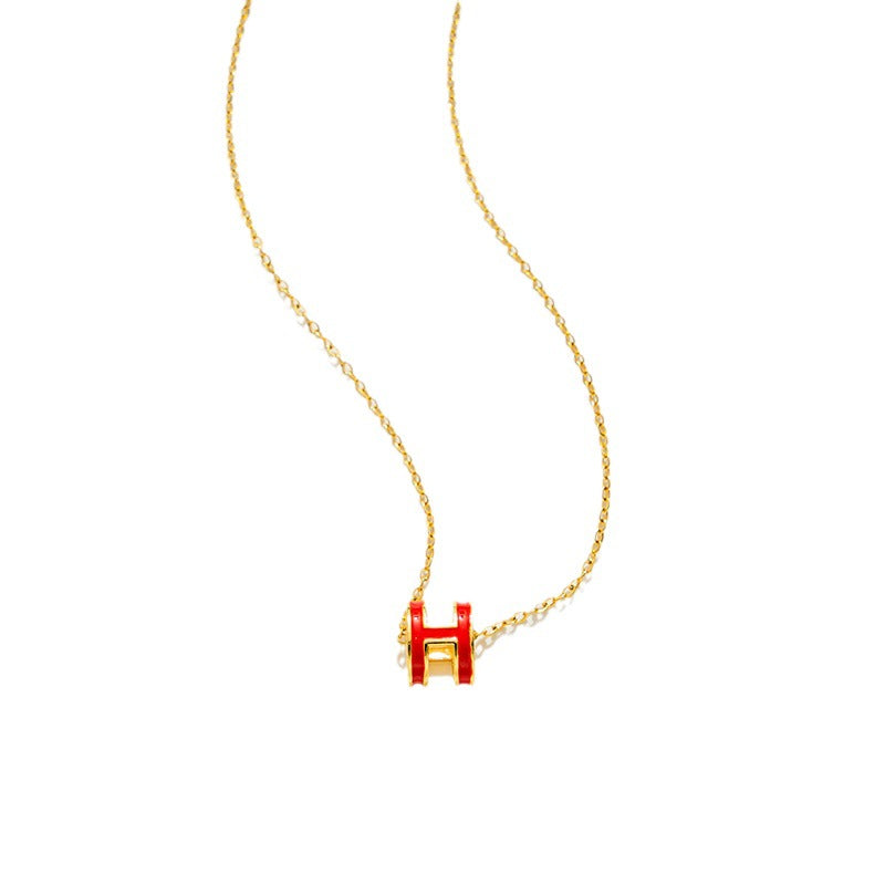 Collana con ciondolo minimalista a forma di H in acciaio al titanio per donna con finitura placcata e catena a O