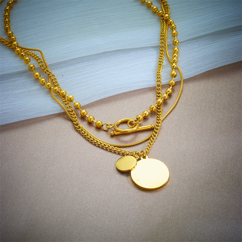Collana vintage a sospensione multipla geometrica rotonda da donna con catena in acciaio al titanio e finitura placcata