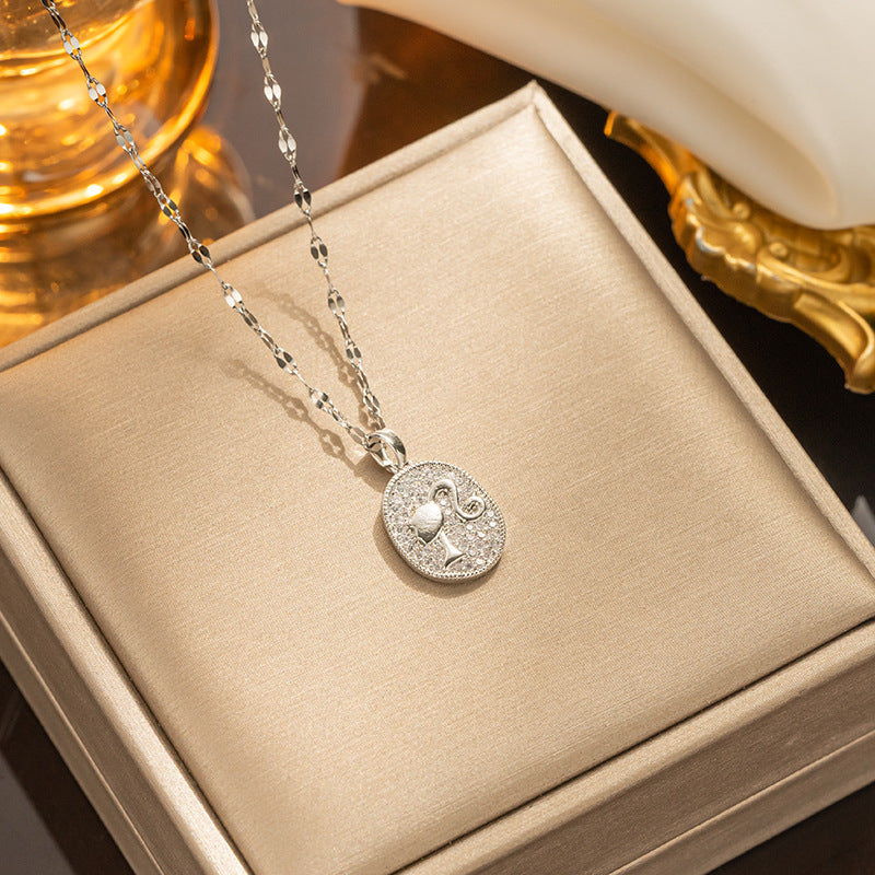 Collar con colgante minimalista de nudo de lazo de acero de titanio para mujer con cadena de serpiente chapada