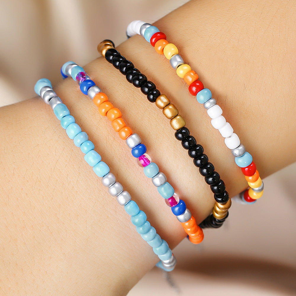 Braccialetto e Cavigliera Multi-strato Boho con Perline Rotonde Artigianali Accessorio Moda