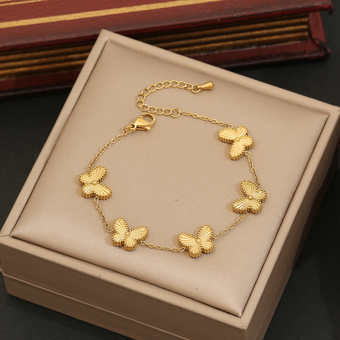 Playful Animal Style Butterfly Pendant Stainless Steel Necklace with Plated Finish for Women