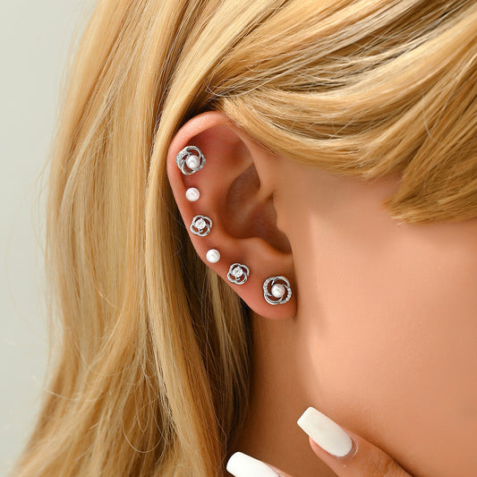 Set de pendientes de mujer minimalistas geométricos con incrustaciones de circonitas y detalles de perlas, diseño de pétalos florales