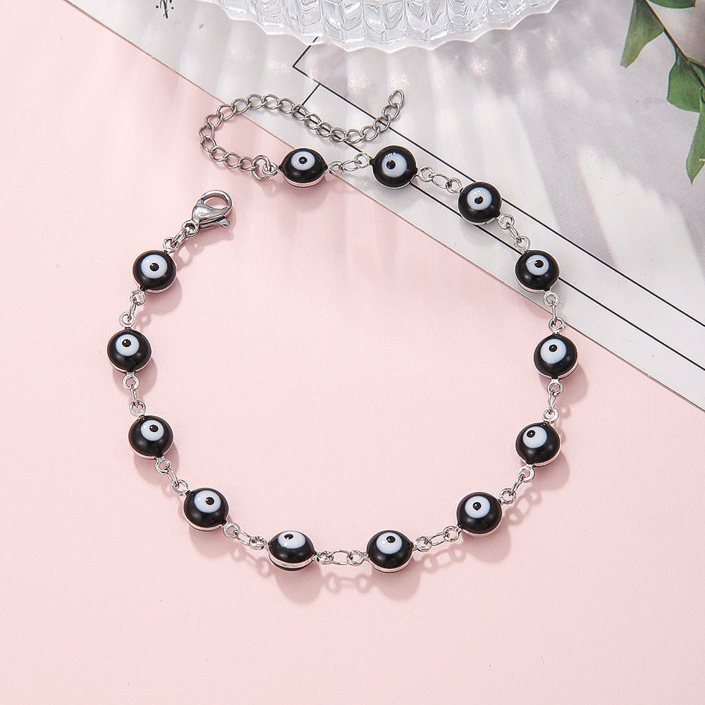 Cavigliera e braccialetto in acciaio inossidabile in stile bohémien colorato con occhio di Allah e motivi geometrici e a cuore