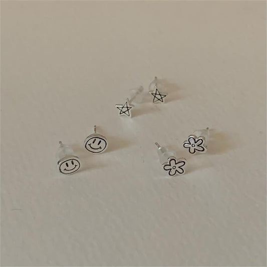 Orecchini Minimalisti a Stella Sorridente con Fiore in Argento Sterling 925 con Finitura Placcata