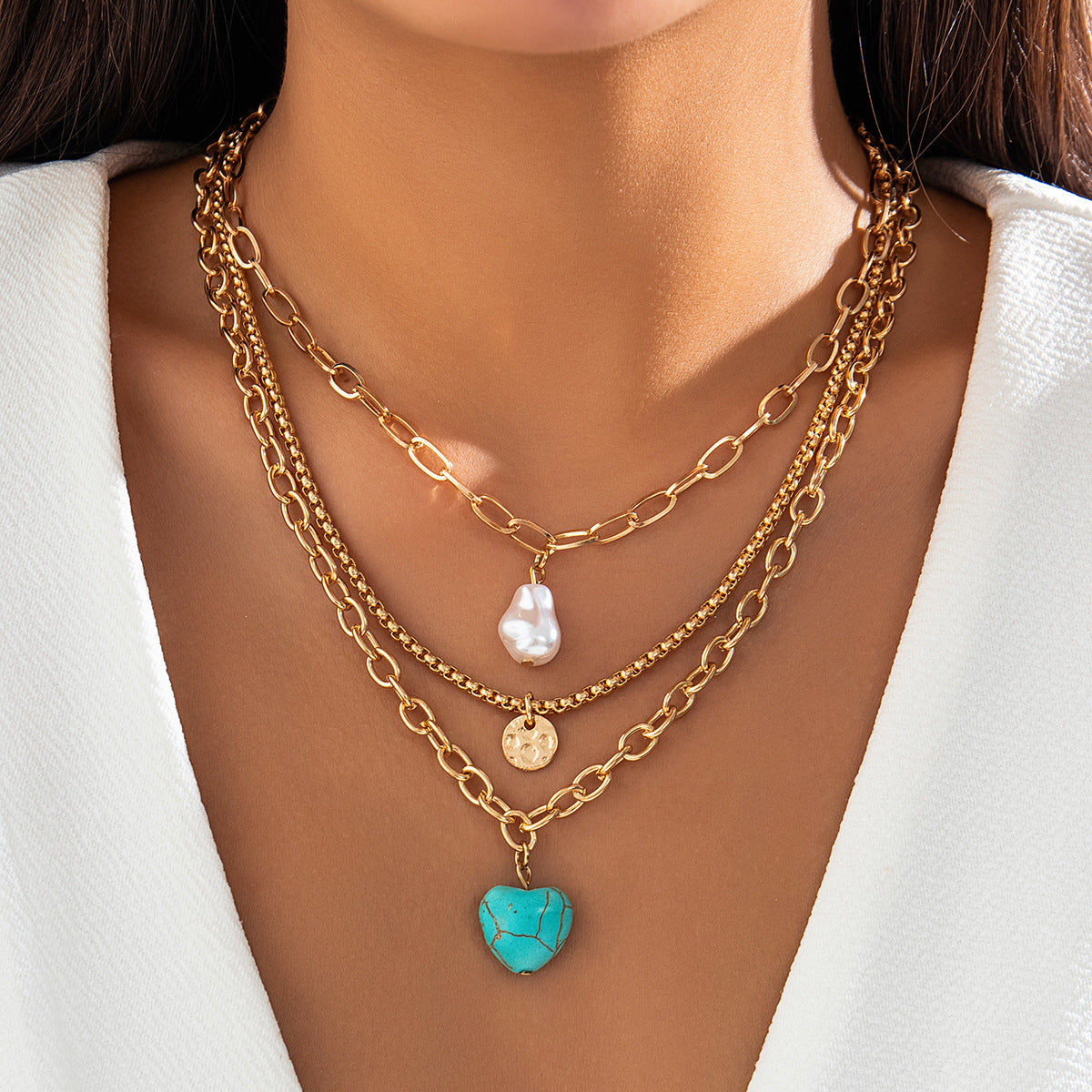 Collar con colgante de aleación con forma de corazón, de estilo barroco étnico, con acabado chapado y detalle de turquesa para mujer