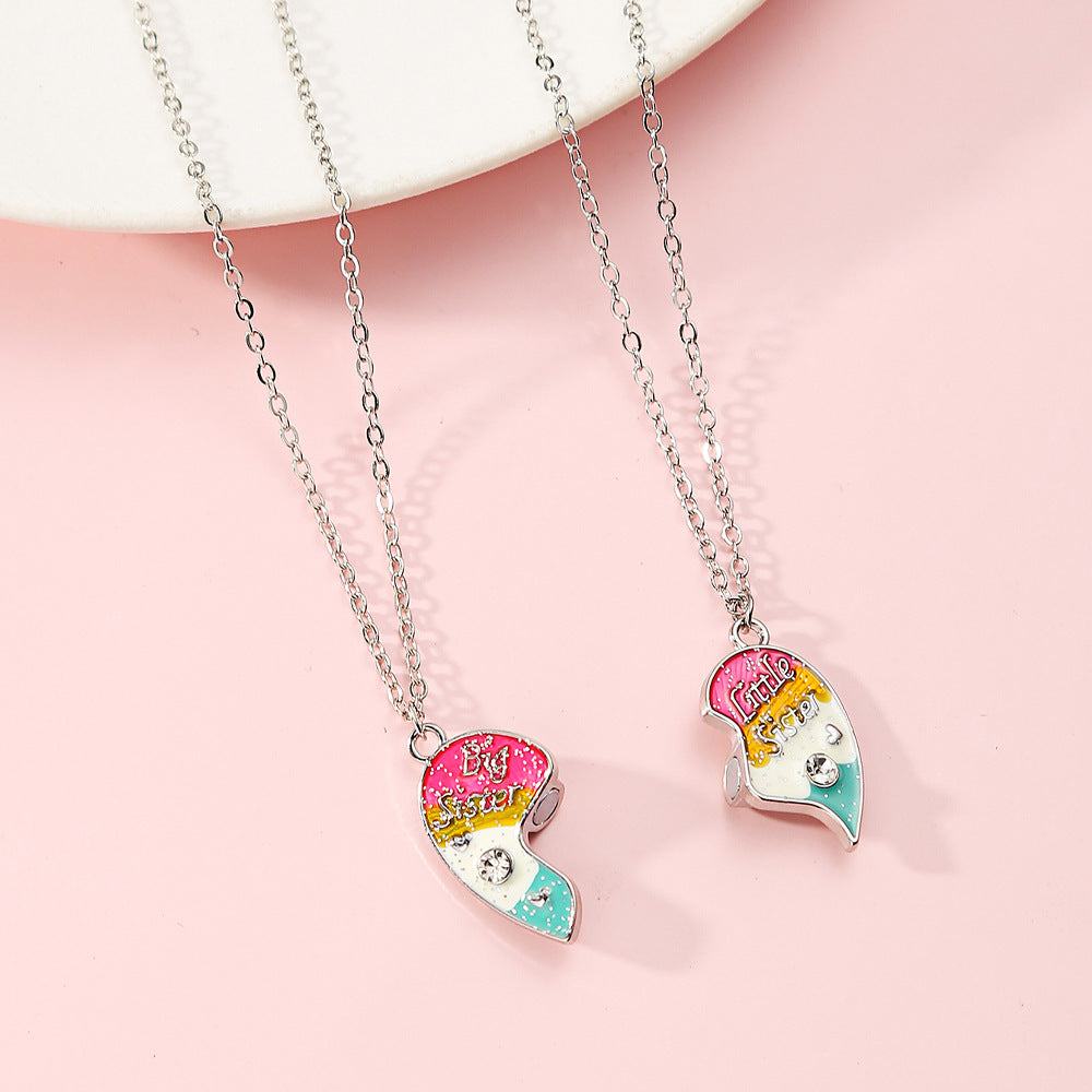 Precioso collar de aleación con forma de corazón y acabado esmaltado para niños, diseño de cadena cruzada con detalles de diamantes de imitación