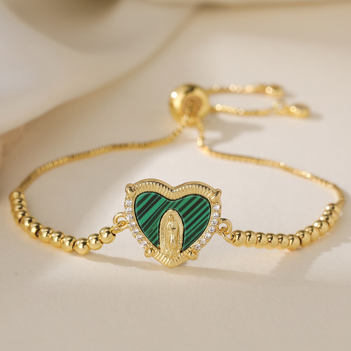 Gold Plated Brass Heart Bracelet with Cubic Zirconia and Virgin Mary Charm for Women