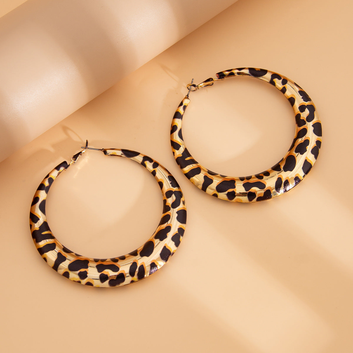 Geometric Metal Hoop Earrings for Women with Plated Finish and Bold Leopard Print Accent