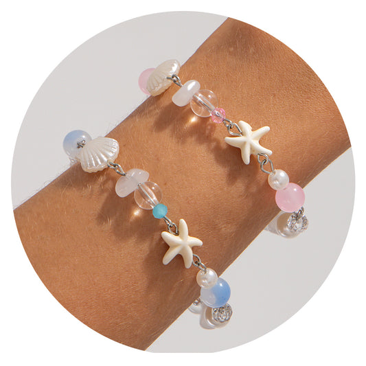 Bracciale Nappe Minimalista con Conchiglie e Stelle Marine in Acrilico con Lavorazione Artigianale per Donna