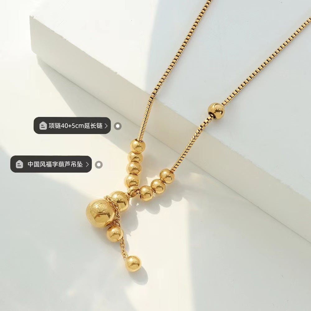 Collana con ciondolo a zucca a perline rotonde con carattere Fu in stile cinese minimalista, in acciaio al titanio placcato oro, unisex