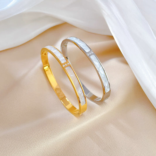 Bracciale Minimalista Etnico Vintage con Conchiglie in Acciaio al Titanio