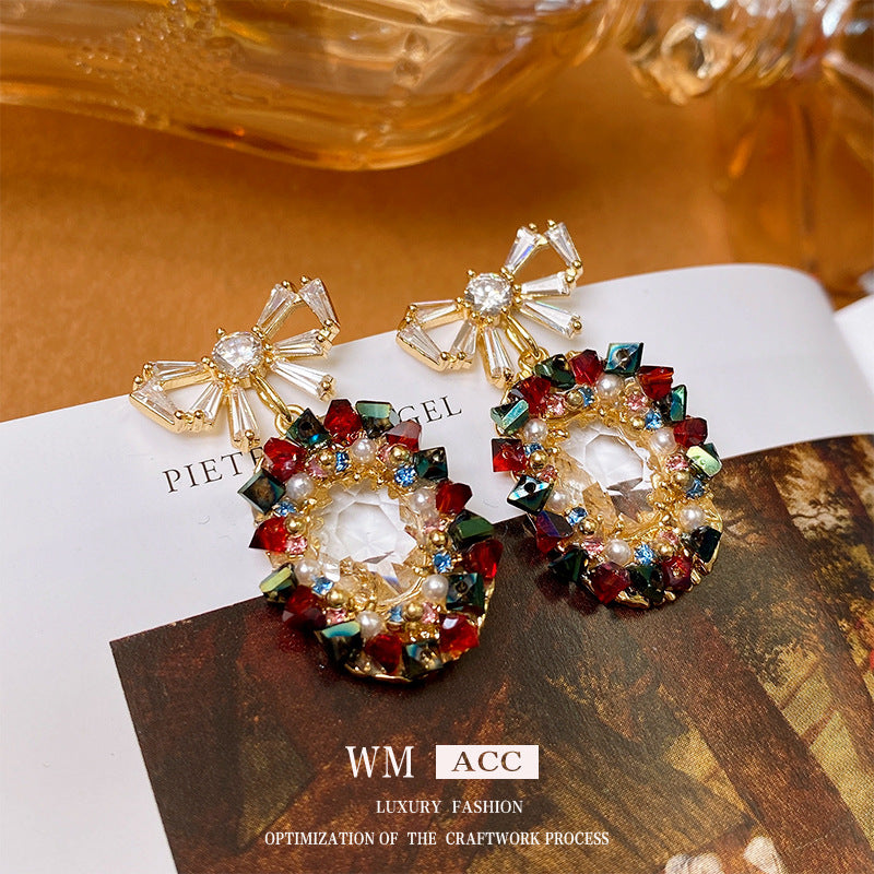 Elegantes pendientes de perlas y circonitas con forma ovalada y lazo en acero inoxidable para mujer