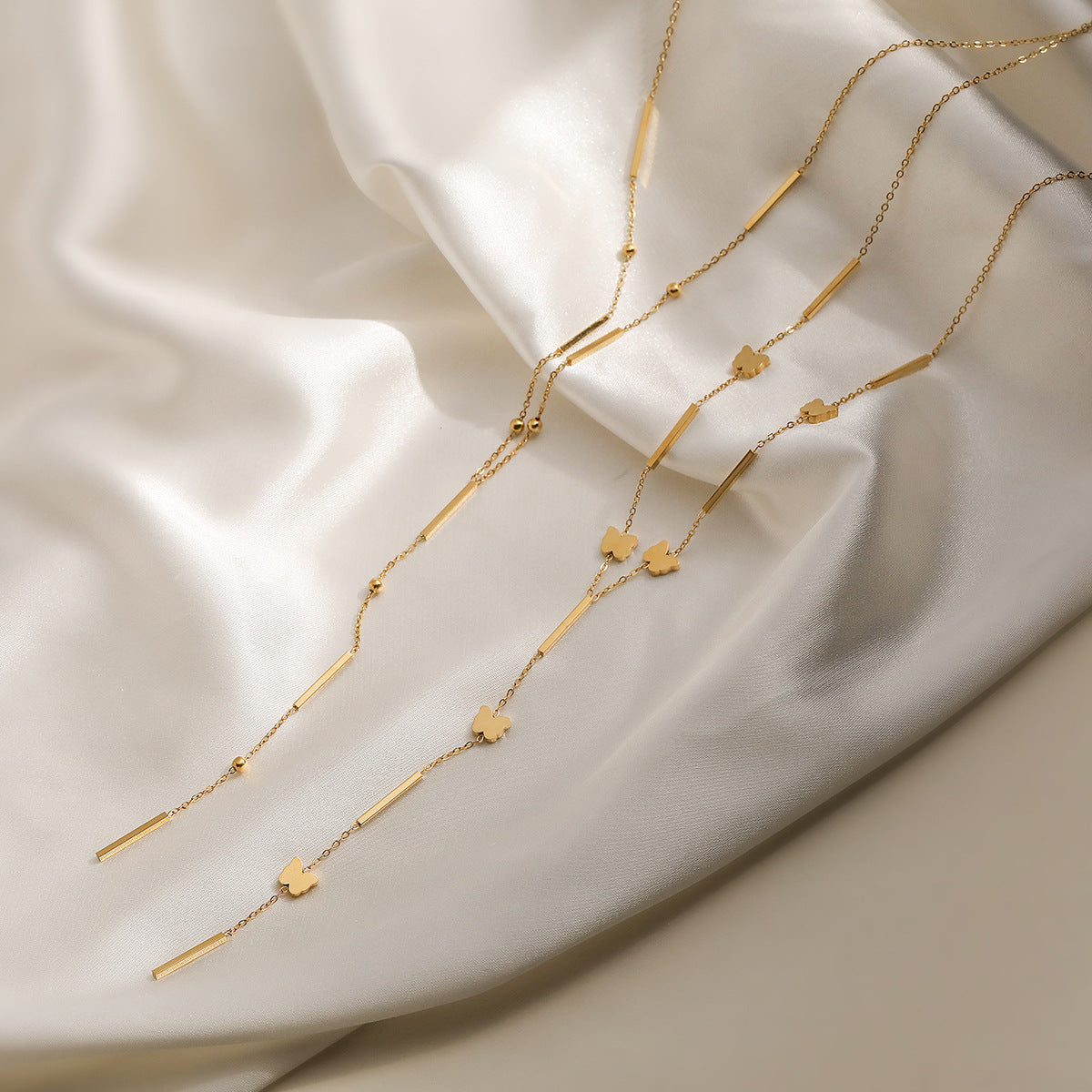Geometric Butterfly Pendant Necklace for Women in Stainless Steel with 18K Gold Plating, Fashionable Minimalist Lightweight Luxury Design