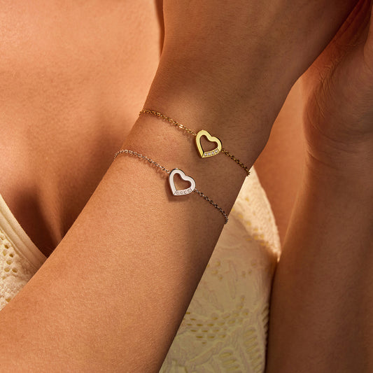 Pulsera minimalista de acero inoxidable con corazón hueco para mujer y acabado chapado