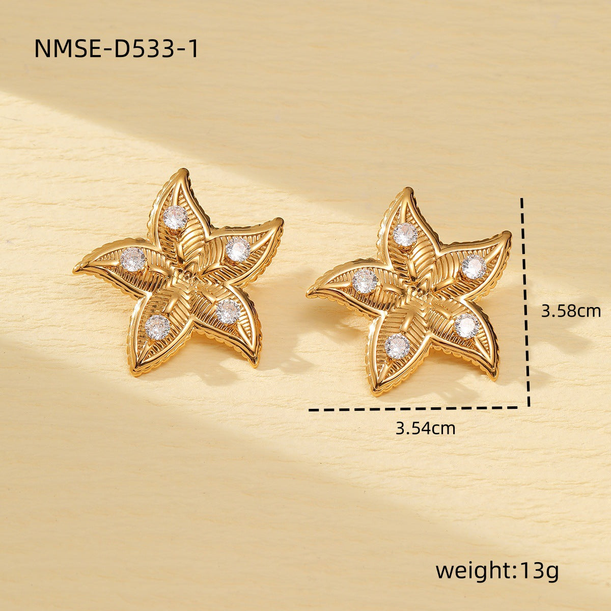 Elegante conjunto de pendientes y anillo de acero de titanio con forma de corazón y motivo de estrella de mar, galvanizado para un aspecto premium resistente a la decoloración