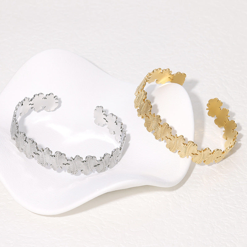 Pulsera de Acero Titanio Minimalista Natural con Forma de Hoja con Baño de Oro para Mujer
