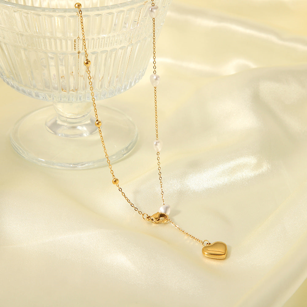 Minimalist Heart-Shaped Titanium Steel Pendant Necklace for Women with Plated Stainless Steel Chain and Pearl Accent