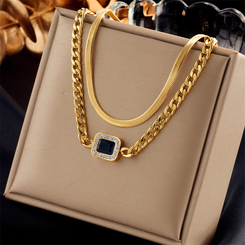 Collana con Pendente Geometrico Irregolare a Croce e Cuore Minimalista in Acciaio al Titanio con Finitura Placcata da Donna
