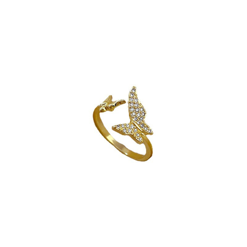Anillo minimalista de latón chapado en oro con forma de mariposa para mujer