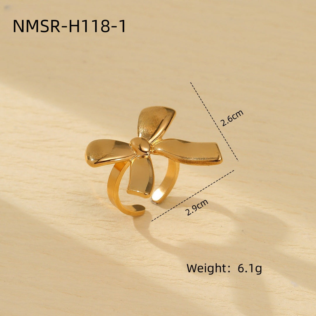 Elegantes Pendientes de Acero de Titanio con Forma de Lazo Bañados en Oro para Mujer