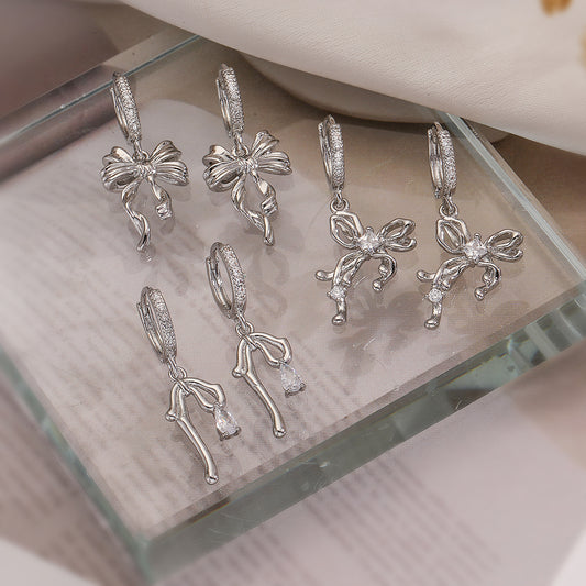 Orecchini pendenti da donna minimalisti in rame a forma di fiocco con placcatura in oro 18K e intarsio in zirconi
