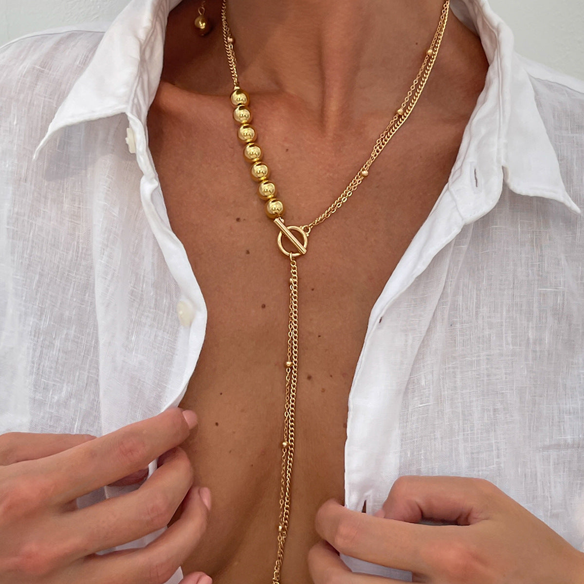 Collana a Y asimmetrica con ciondolo a nappa e catena in metallo, in stile business, da donna