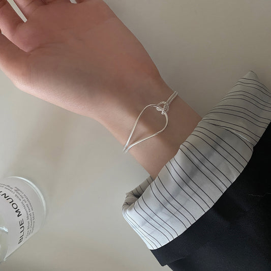 Pulsera Minimalista de Plata de Ley 925 con Nudo Geométrico para Mujer