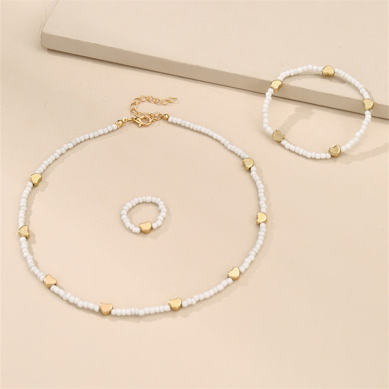 Collar con colgante de corazón de cuentas de cristal hecho a mano, estilo bohemio minimalista para niños
